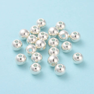 6mm Round Spacer Bead (304 Stainless Steel).  Stainless Color.  *Packed 25 Beads.