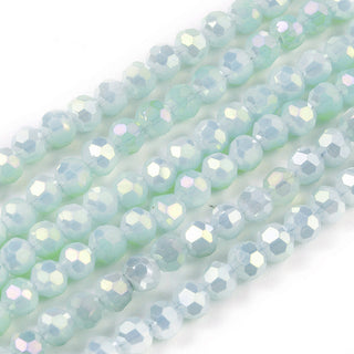 Glass Faceted 4mm ROUND Beads.  *Full Rainbow Plated Electroplate. Soft Pale Green. *approx 100 Beads.