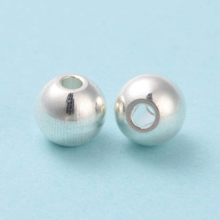 6mm Round Spacer Bead (304 Stainless Steel).  Stainless Color.  *Packed 25 Beads.