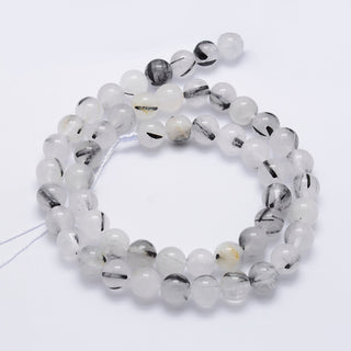 Clear Quartz with Tourmaline.  (8 Rounds)  *approx 50 beads per strand