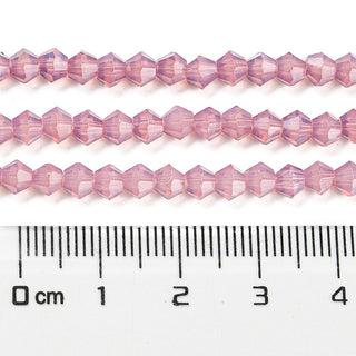 Transparent Glass bicone, Flamingo "Opalite Finish", Faceted, Bicone, , 4mm, Hole: 0.9mm.  Approx 85 Beads